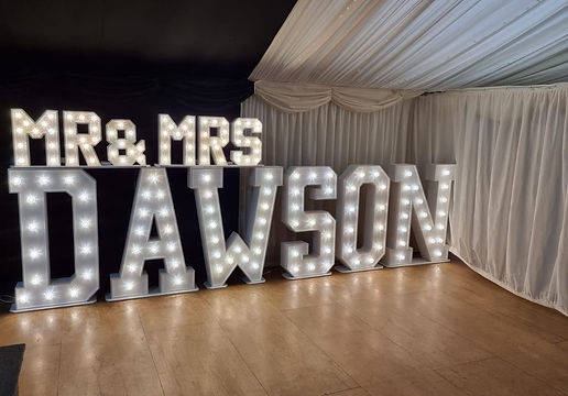 Light up mr & mrs letter at a wedding