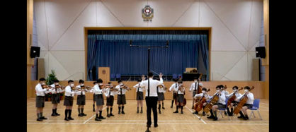 John Chan Teaching Orchestra.jpeg