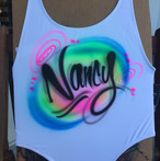 Mobile airbrush artist booths for parties, mitzvahs, sweet 16s, quinces, fairs, carnivals and corporate events. Graffiti Pop Events - Airbrush Artists, 305-918-2975, info@graffiti-pop.com, www.graffiti-pop.com.