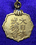 武専 金バッヂ
