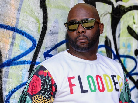 The Parade Man is a family-friendly performance persona created by Smyly Sickwitit, shown leading a joyful parade with children and adults, designed for parades, festivals, schools, and community events.