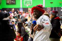 Jeramie Regis Sr at the DotHouse Annual Children's Christmas Party in Dorchester