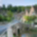 Castle Coombe bridge and row of houses in historic village