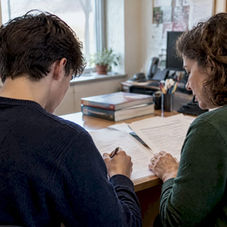Student and parent reviewing high school course options