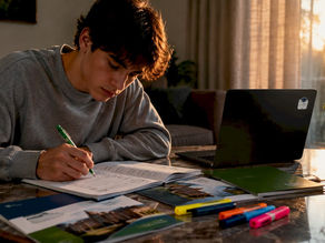 Student checking college application timeline