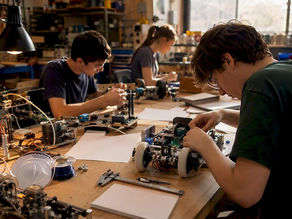 Hands assembling engineering prototypes