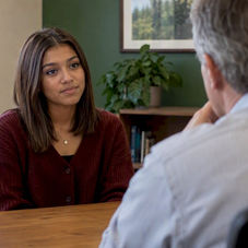 Student taking a breath during college interview