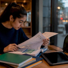 Student reviewing college admissions portfolio