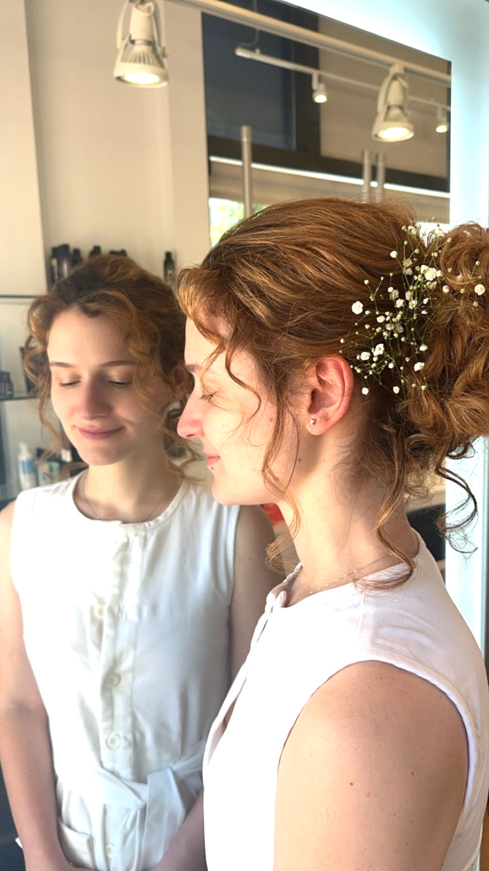 wedding hair image looking in a mirror