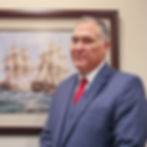 Eric F. Dankesreiter, civil trial attorney, smiling in a professional headshot.