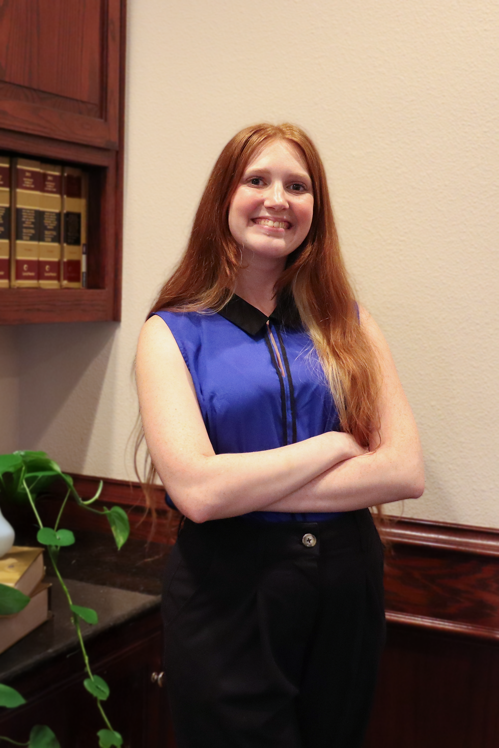 Anna, pictured in a polished professional photograph.