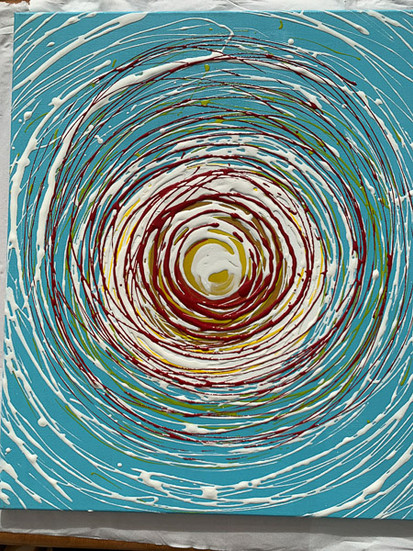 Acrylic pouring painting in progress.