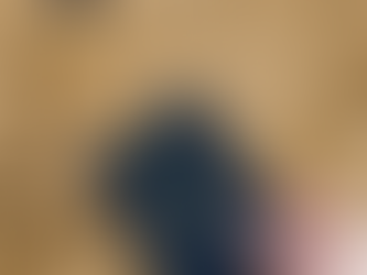 A hand holds a blue United States passport over a vintage-style map of Portugal and Spain. The passport is adorned with a small Progress Pride flag sticker and "The Asylum Project" logo, featuring the tagline "You Are Not Alone." In the upper left, the organization’s full logo—a shield with rainbow borders and two clasped hands—is displayed against the aged parchment background of the map.