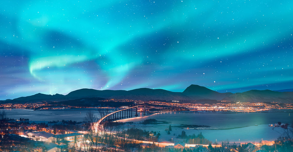 Aurora borealis or Northern lights in the sky over Tromso with Sandnessundet Bridge - Trom