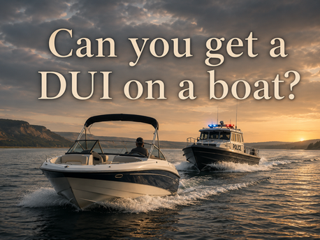 Police patrol boat trailing a motorboat illustrating DUI on a boat in North Dakota