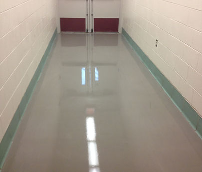 A Screed Bar Was Used to Level The Small Diameter Stone Used To Strengthen the Repair