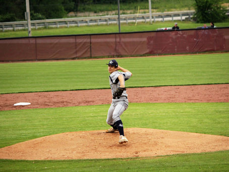 Pitchers Duel Cougars Win