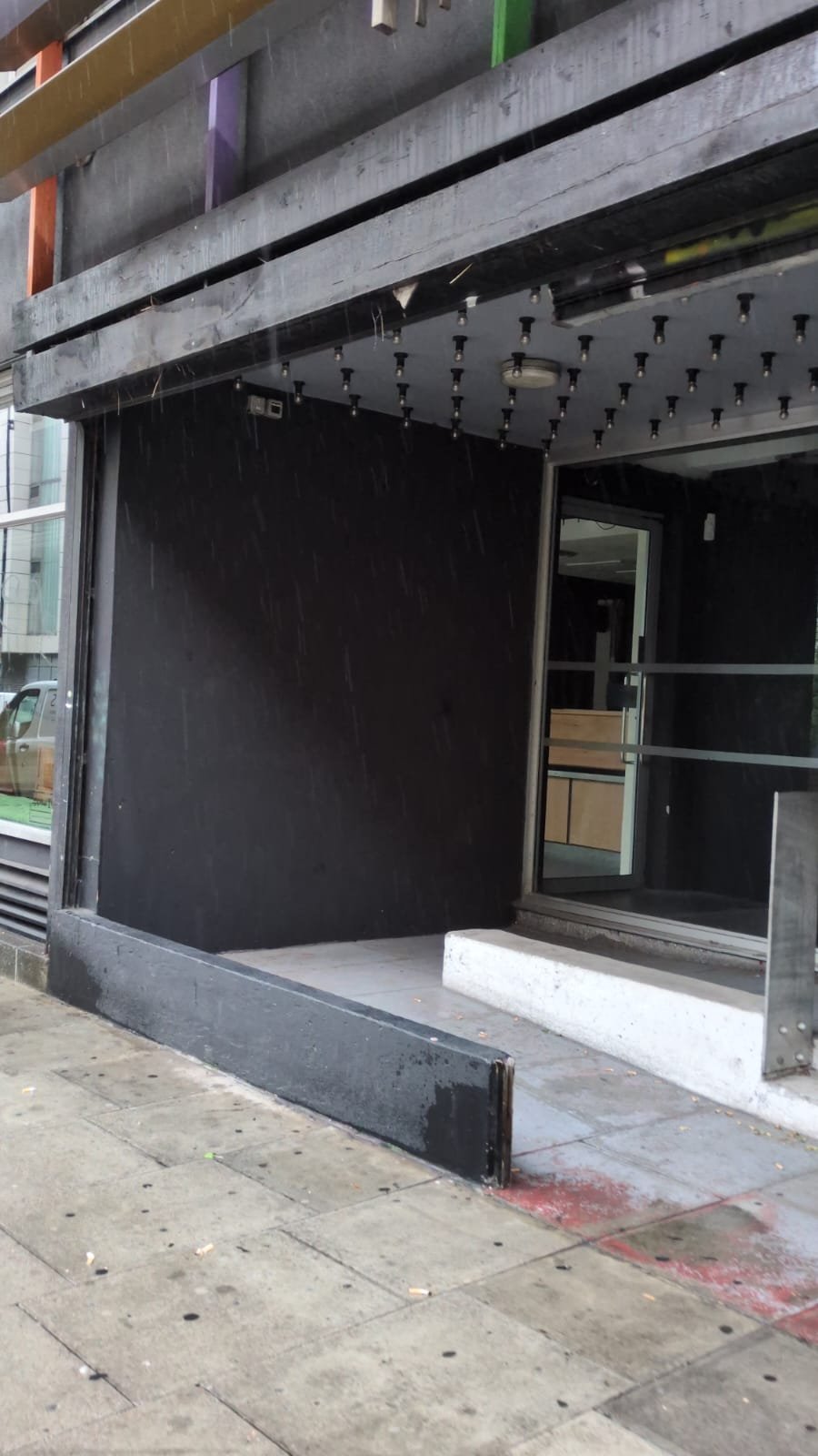A permanent ramp at the entrance of the building.