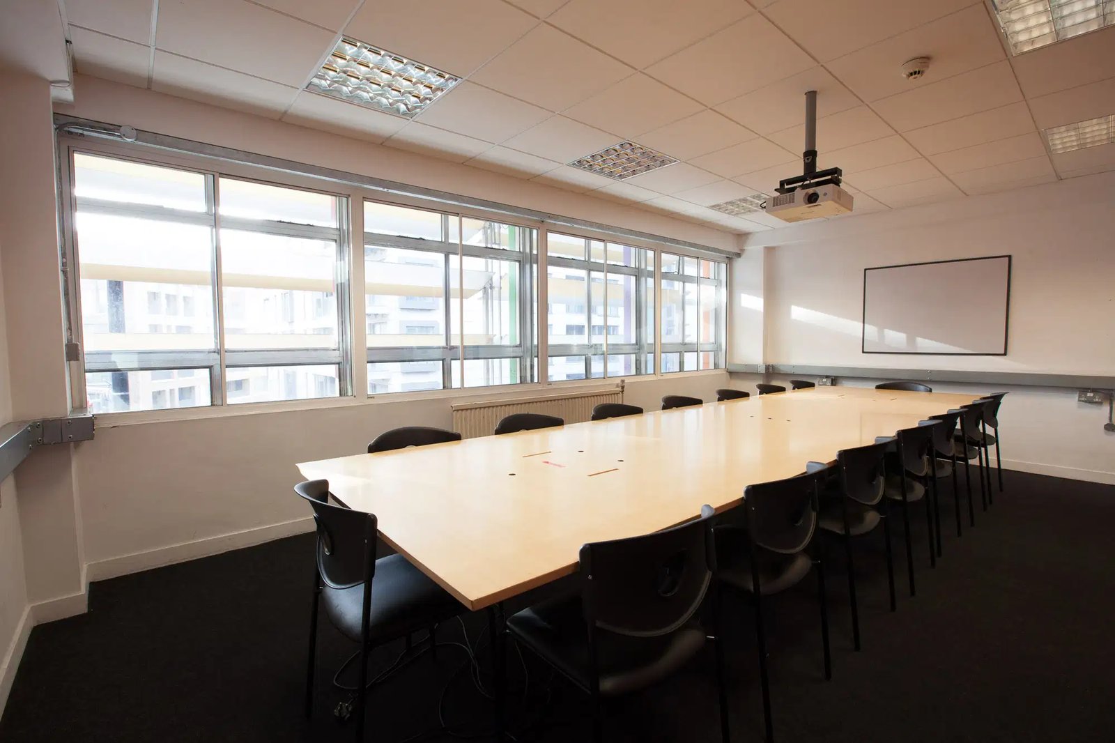 The Quiet Room: a large room with a large board table and seating around it.