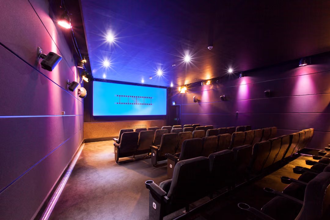 Cinema 3: a large cinema-style room with a screen at the front.
