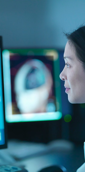Doctor Analyzing Scans