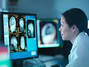 Doctor analyzing brain scans