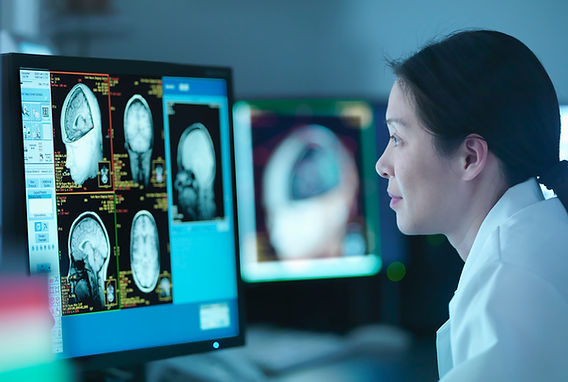 Doctor Analyzing Scans