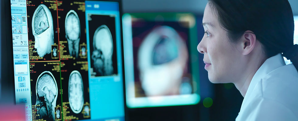 Doctor analyzing brain scans