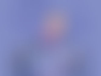 Executives discussing which direction to go at a crossroads with various direction signs