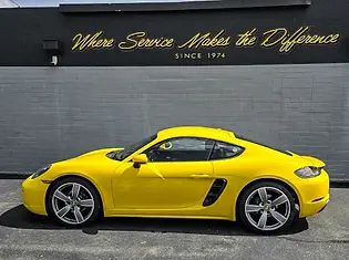 Porsche Yellow Cayman.webp