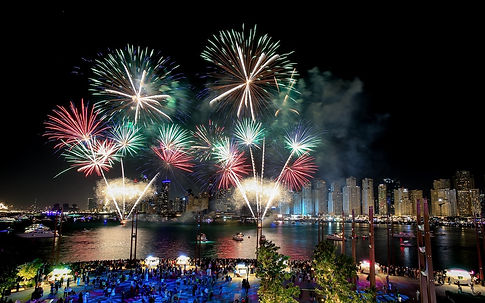 A dazzling spectacle of fireworks illuminating the night sky in the UAE during festivals and events, filling the air with bursts of color and joy, creating a breathtaking and memorable experience for spectators.
