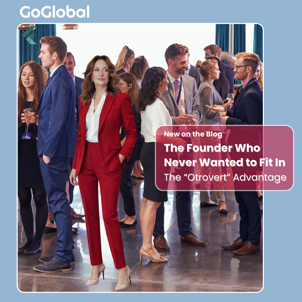 Cover image for a GoGlobal blog post showing Esra Talu in a red suit standing calmly in front of a group of businesspeople in conversation, with the headline “The Founder Who Never Wanted to Fit In” and the subhead “The ‘Otrovert’ Advantage,” plus the GoGlobal logo.