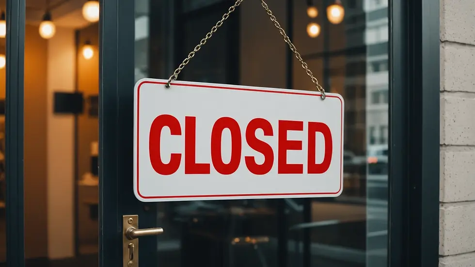 High angle view of a closed sign hanging on a business door