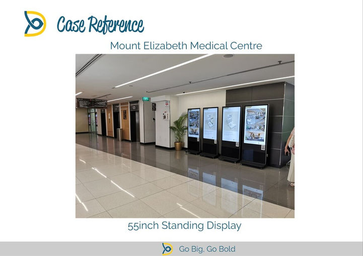 Row of four 55 inch digital standing displays placed at Mount Elizabeth Medical Centre for indoor digital signage