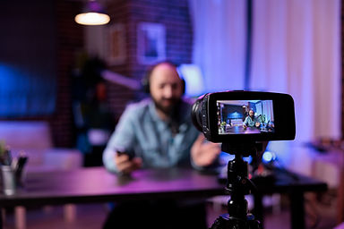 Creator-using-camera-to-record-vlog-1161036 (1).jpg