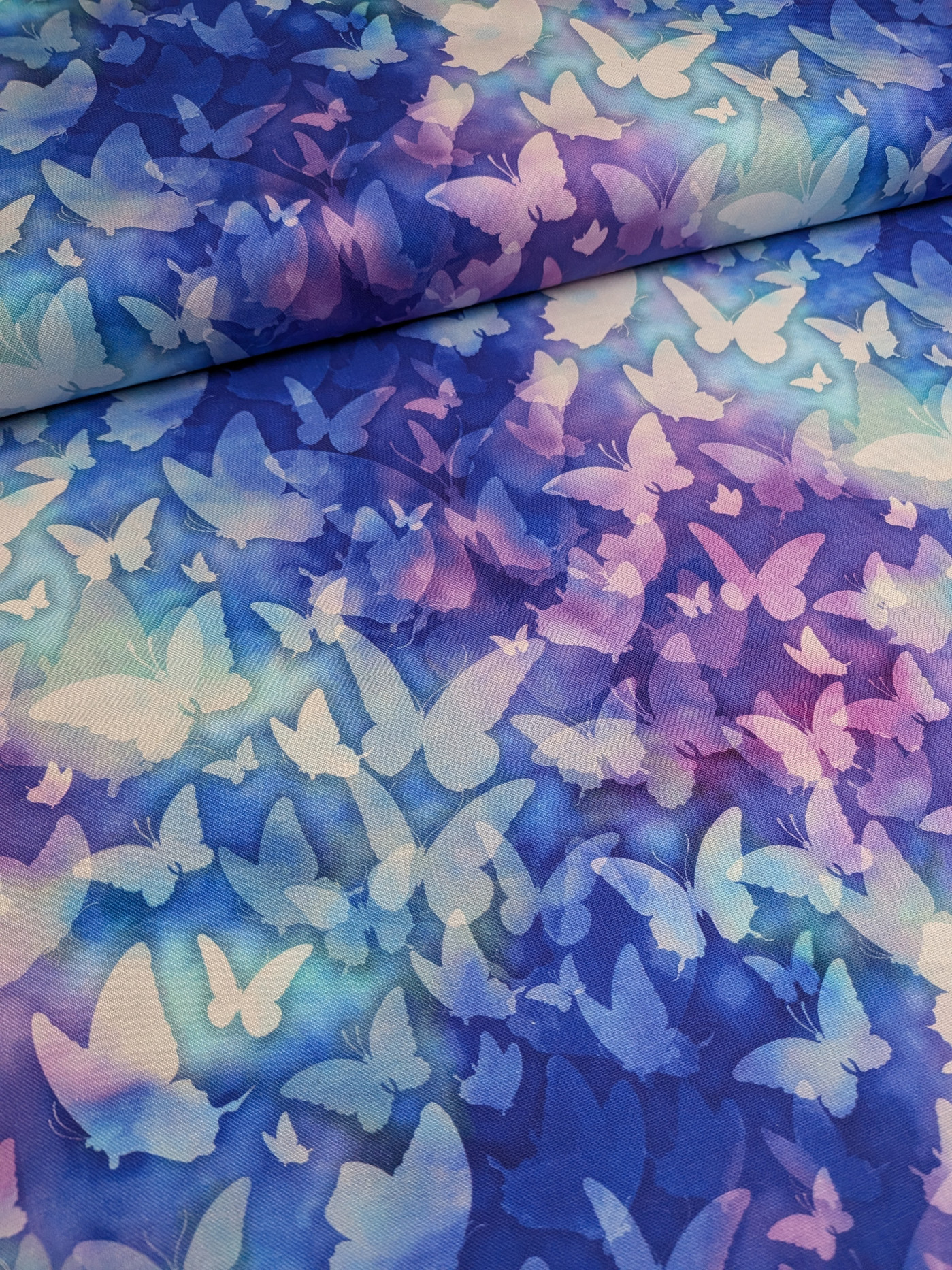 Butterfly Dreams 100% Cotton Fabric featuring vibrant butterfly motifs.