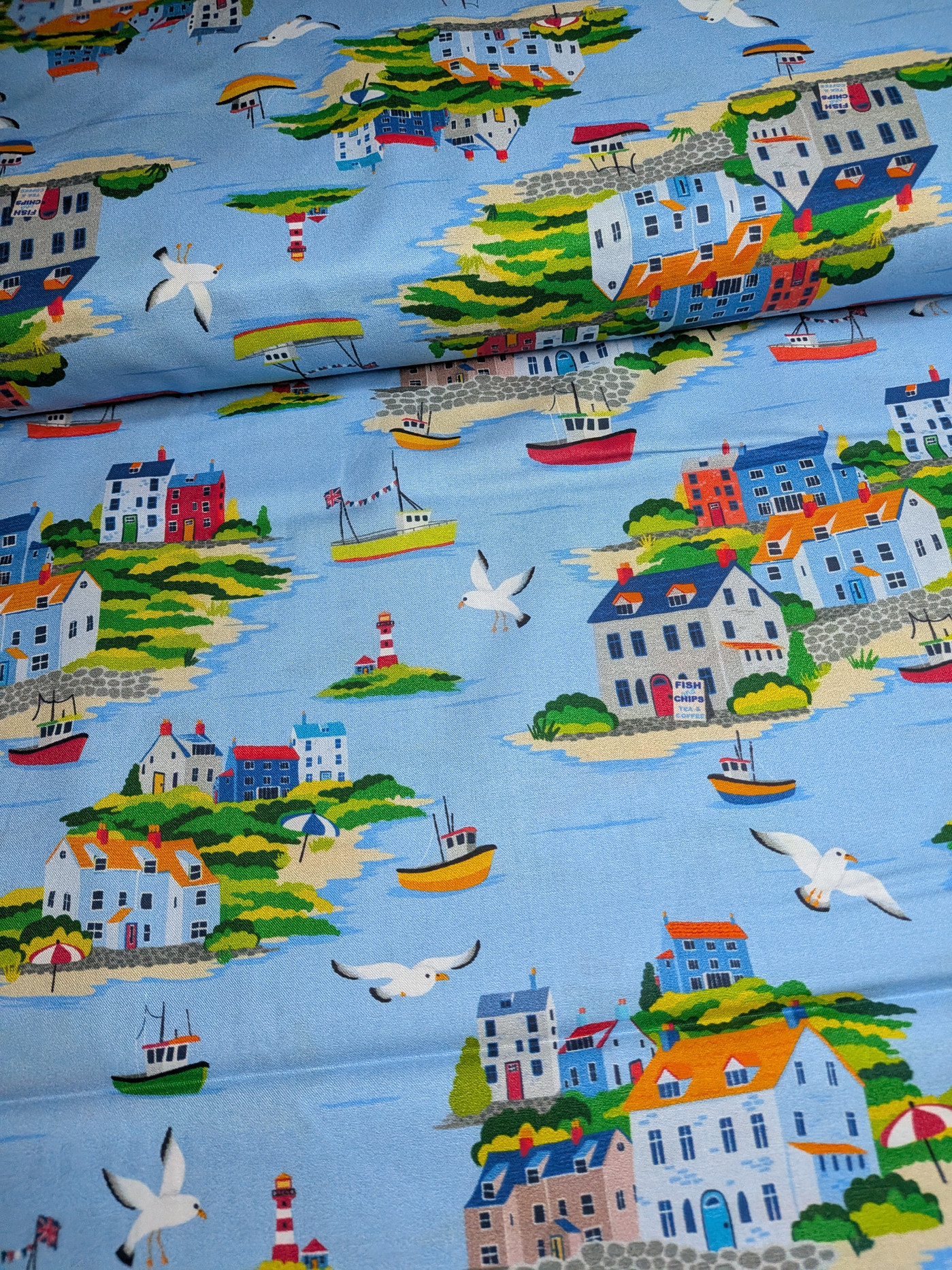 By The Seashore 100% Cotton Fabric with nautical seaside-inspired designs.