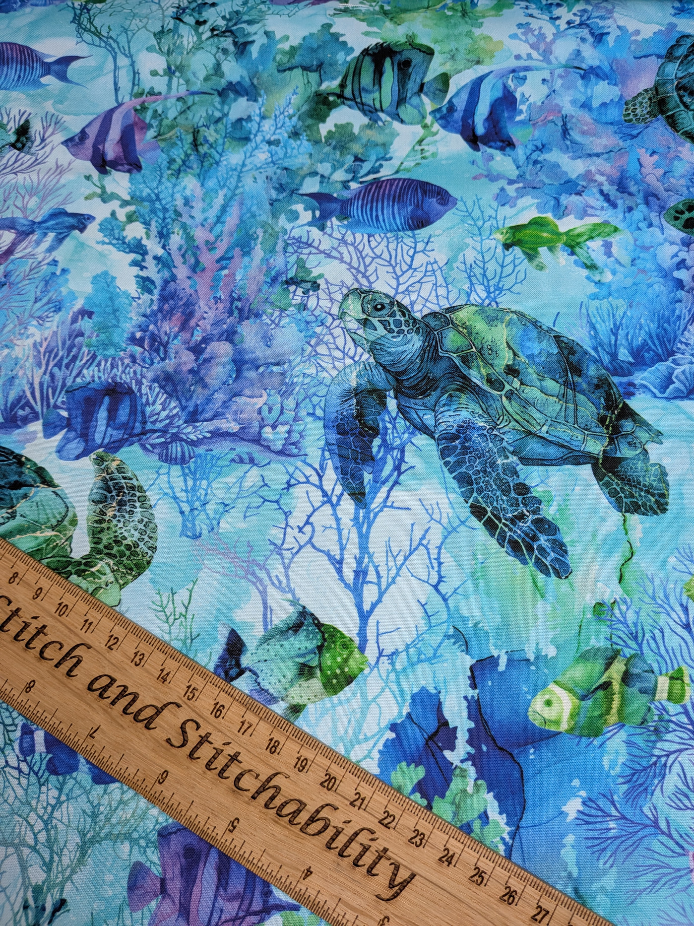 Detailed Coral Reef 100% Cotton Fabric with intricate oceanic motifs.