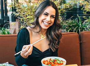 woman in blue long sleeve shirt holding