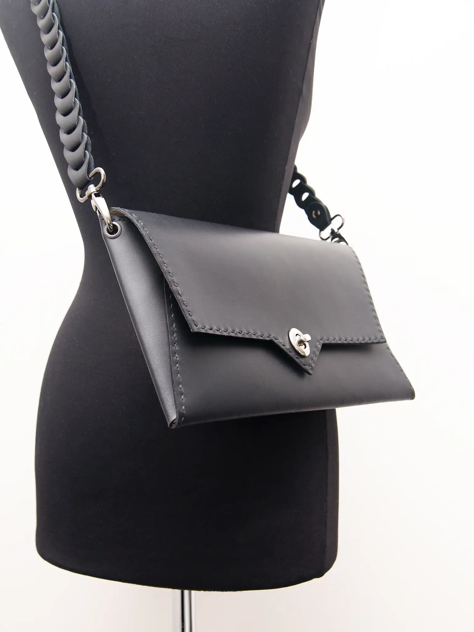 black leather hand sewn pochette made in italy