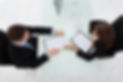 direct hire recruting desk contract being read over