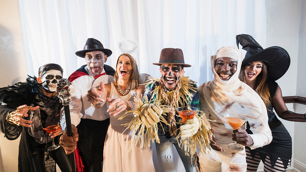 family wearing costumes for halloween