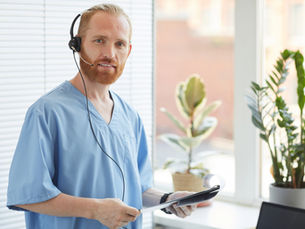 A healthcare professional answers after hours calls at a medical practice.
