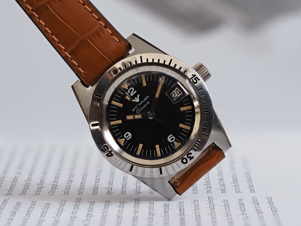 Miniature : Wittnauer Skin Diver ref. 4000 39mm Black Dial Pumpkin Patina