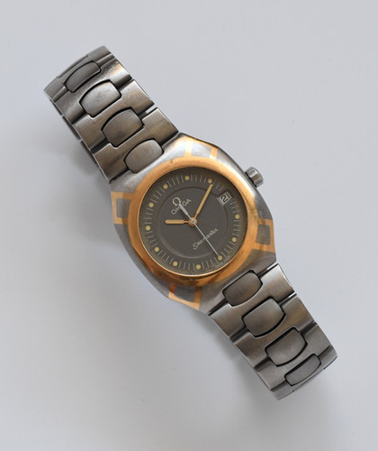 時計 Omega Seamaster Polaris Dial QuartzWatch OMEGA | SEAMASTER POLARIS A YELLOW GOLD, TITANIUM AND