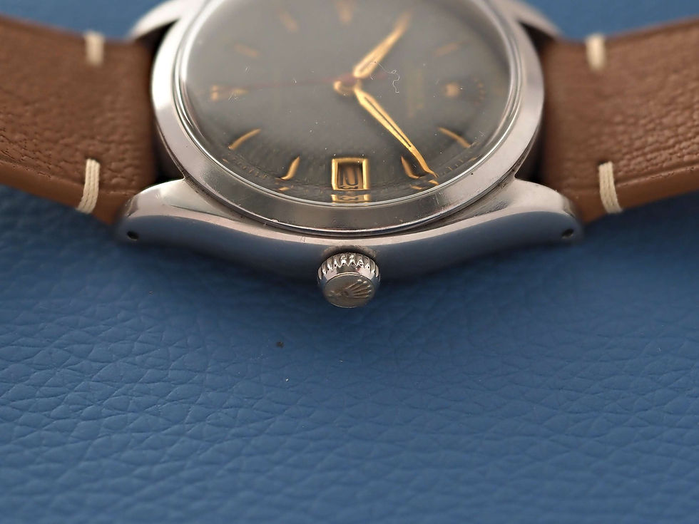 Thumbnail: Rolex Oysterdate 6294 Basket weave Black-Green Dial 1953