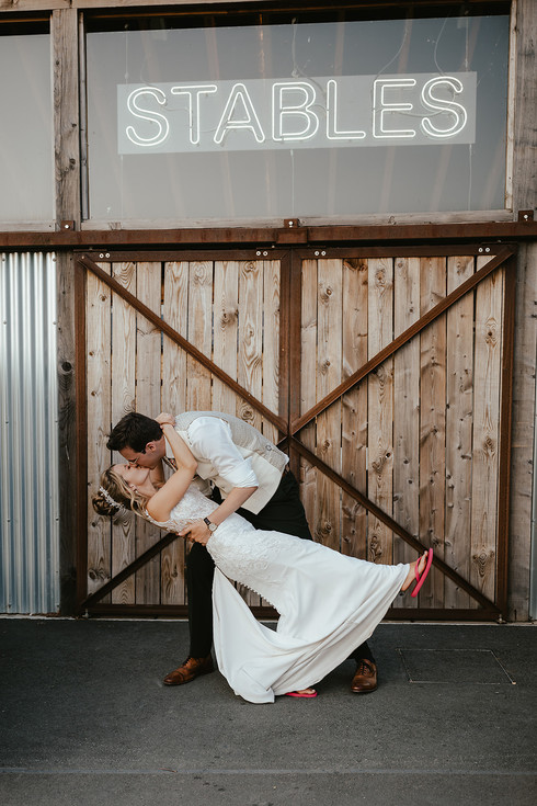 kiss dip out side teh stables sign