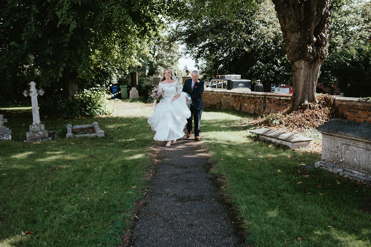 ajfeather-photography-wedding-day-essex-bride-arriving-walking-down-church-path