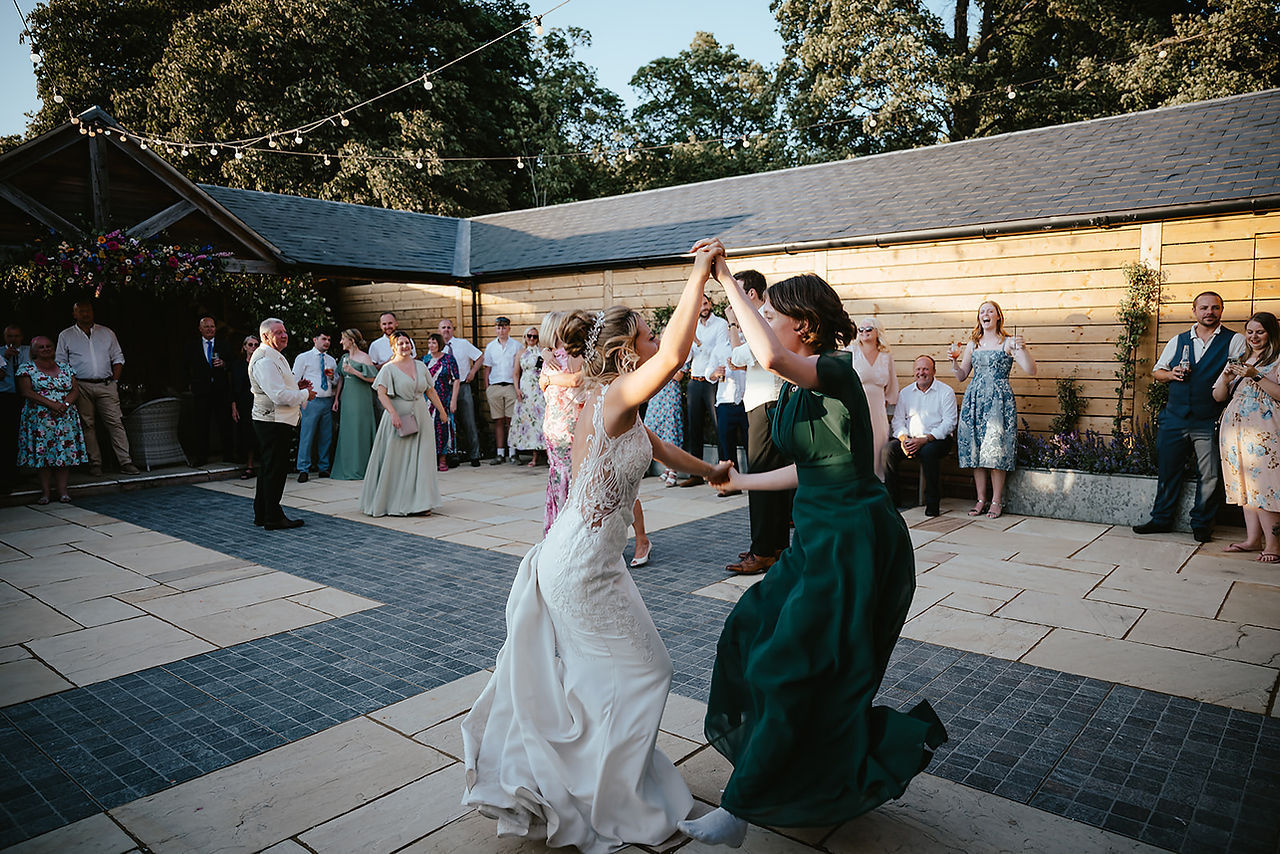 guest dancing at the stables evening madness sunset courtyard