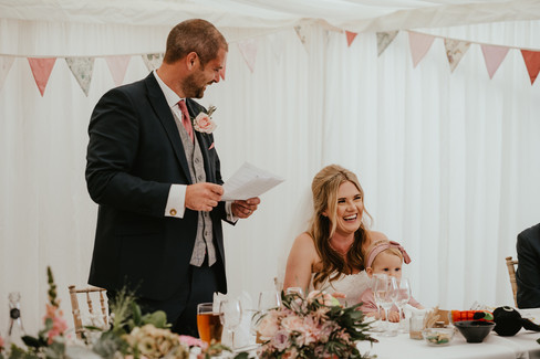 ajfeather-photography-wedding-day-essex-bride-laughing-at-grooms-speach